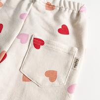 COJIKA 10分丈デイリーパンツ マルチハート柄 ミニ裏毛 オフホワイト 80cm