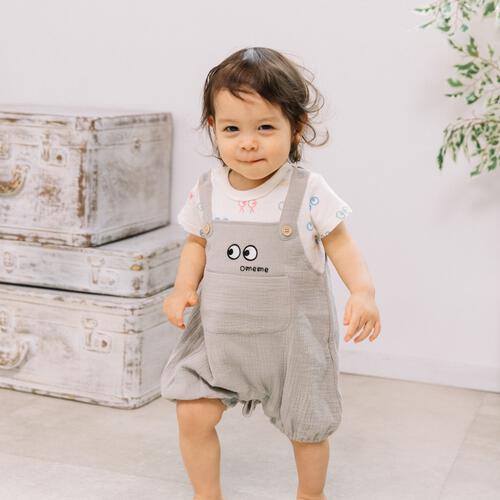 FirstCloset 半袖ロンパース サロペット風 天竺&times;Wガーゼ お目目総柄 ナチュラル&times;70cm